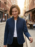 Woman wearing a stand-collar denim jacket