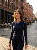 Woman wearing a piped long-sleeve top