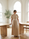 Woman wearing a cotton contrast-trim top and skirt set