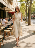 Woman wearing a striped collared tie-waist midi dress
