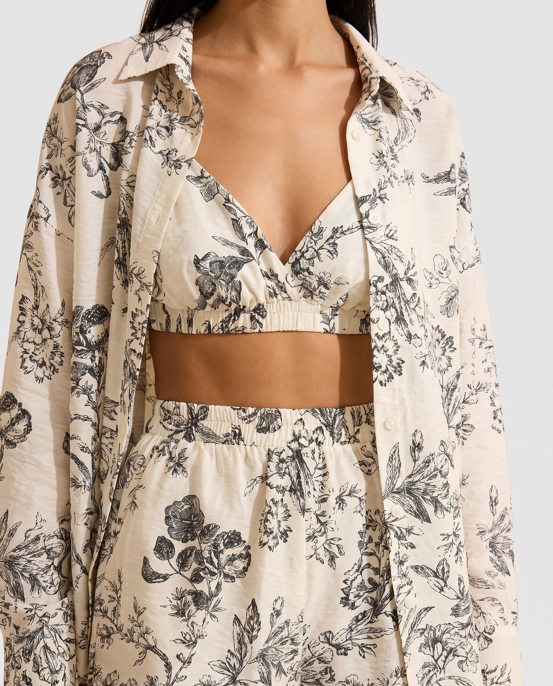 Floral print and waistband detail of the set