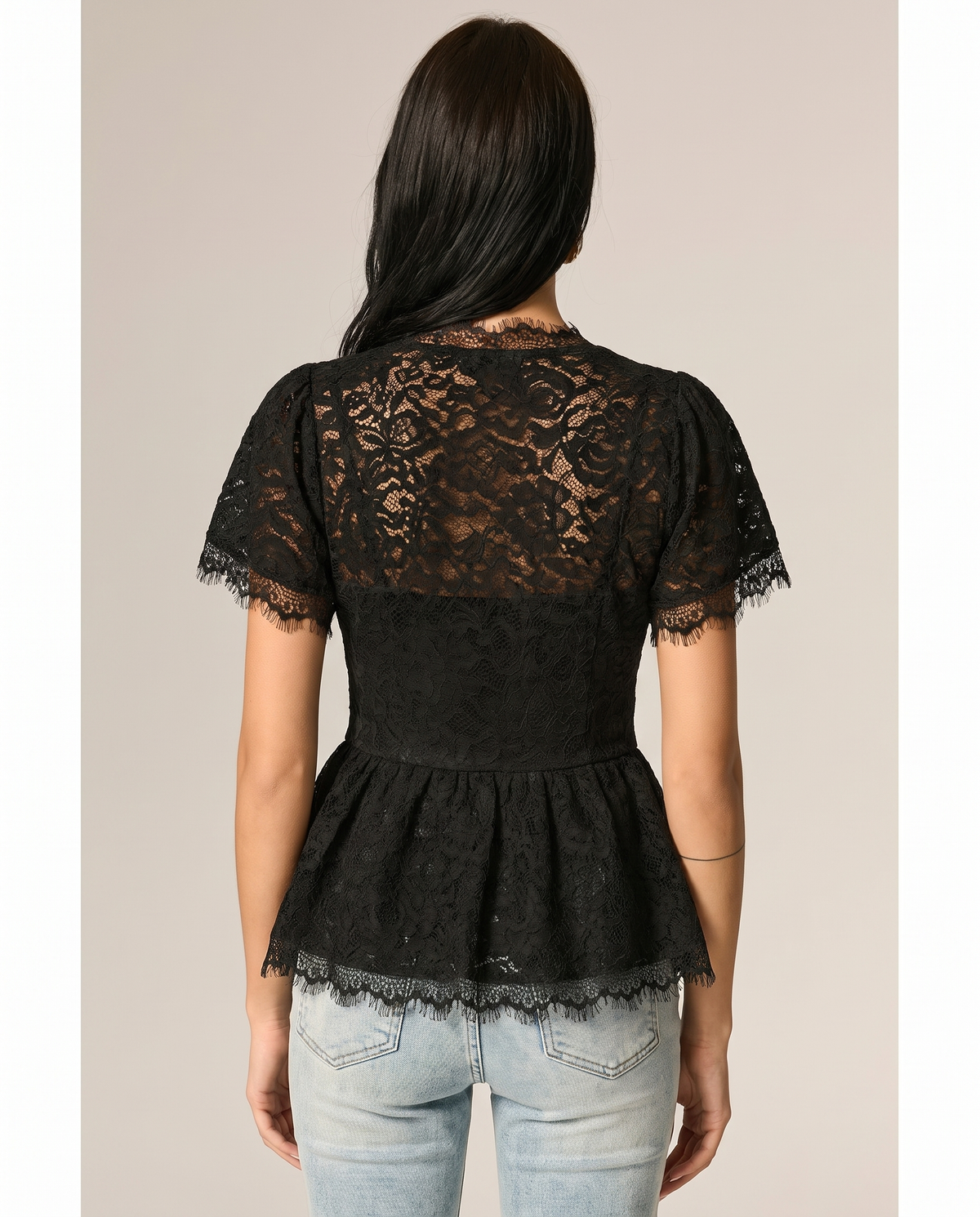 Lace fringe peplum top, back view
