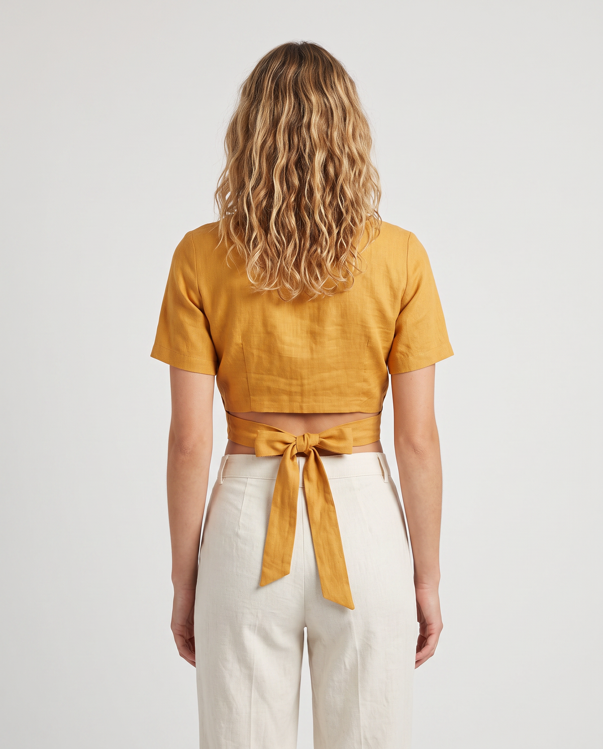 Tie-back wrap cropped short-sleeve blouse, back view