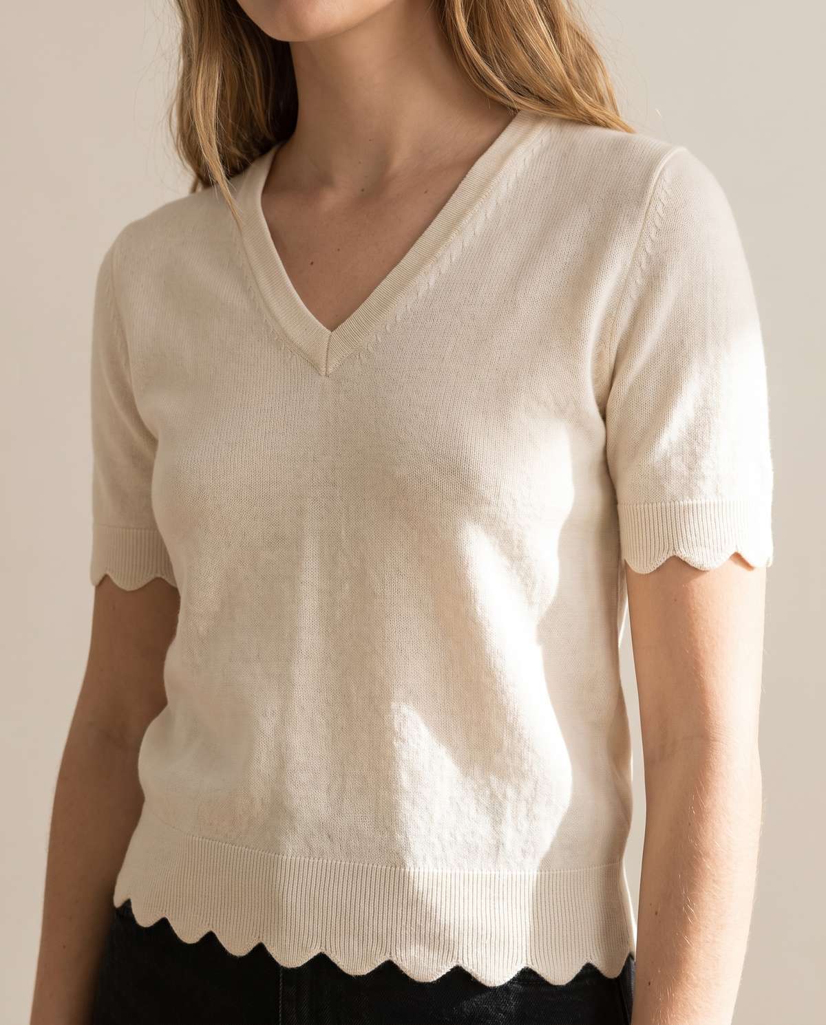 V-neck scalloped-hem knit top, hem detail