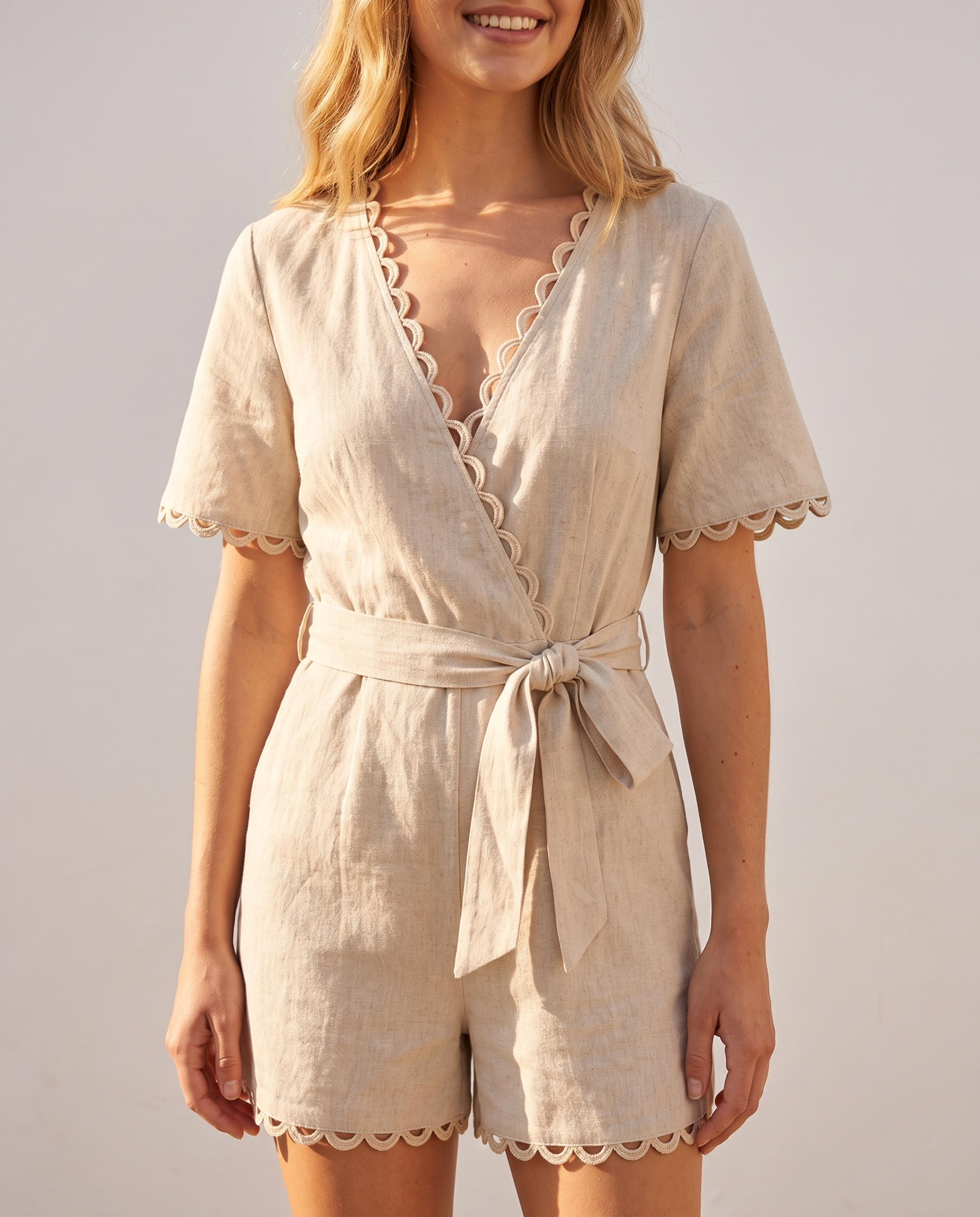 Linen-blend scallop-trim belted romper, trim detail