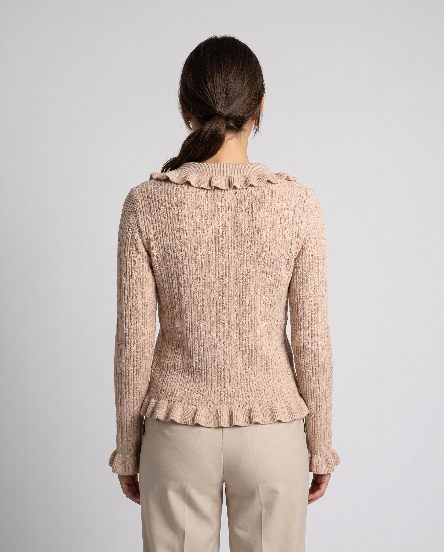 Ruffled button-down knit top, back view