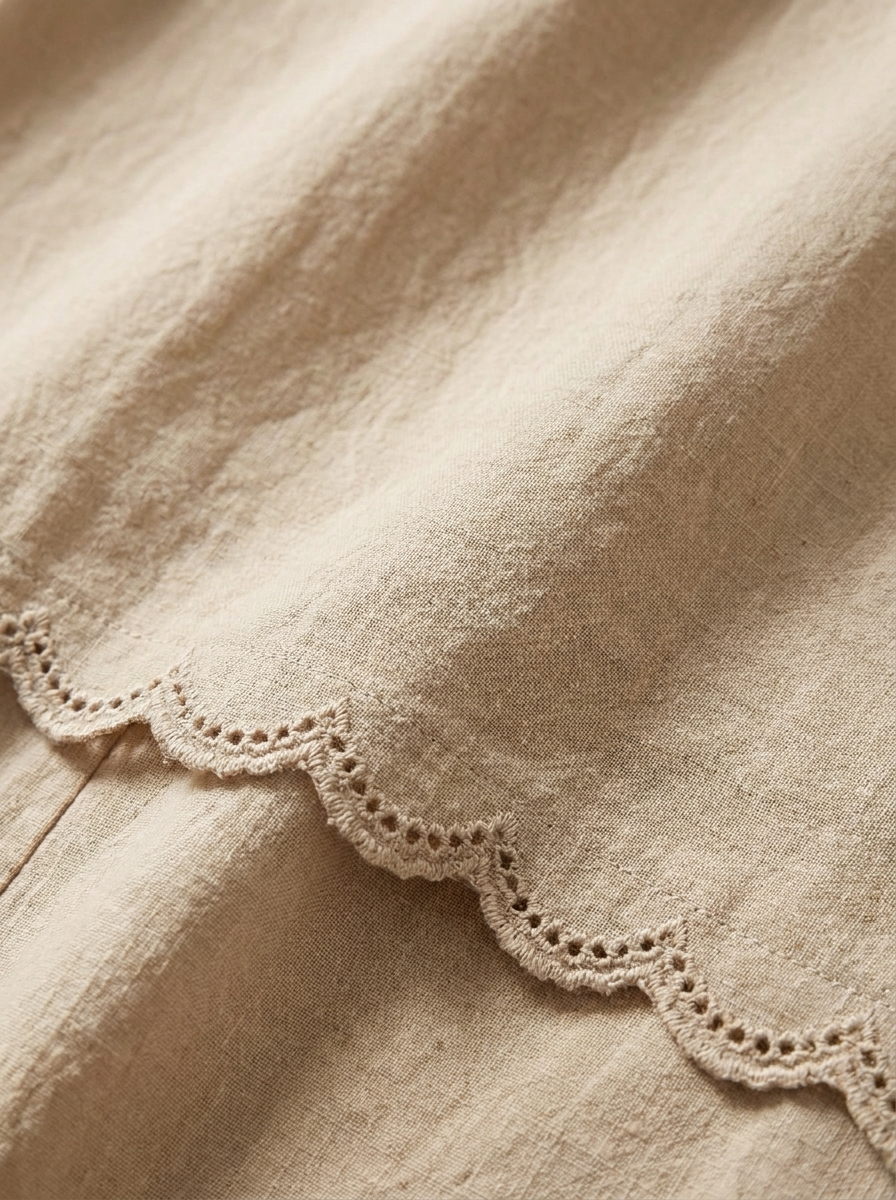 Scallop trim and cotton linen fabric detail