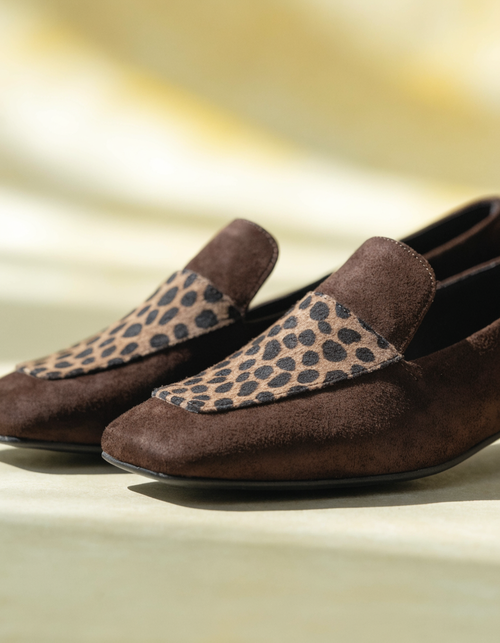 Dark brown faux suede loafers with an animal print panel and square toe