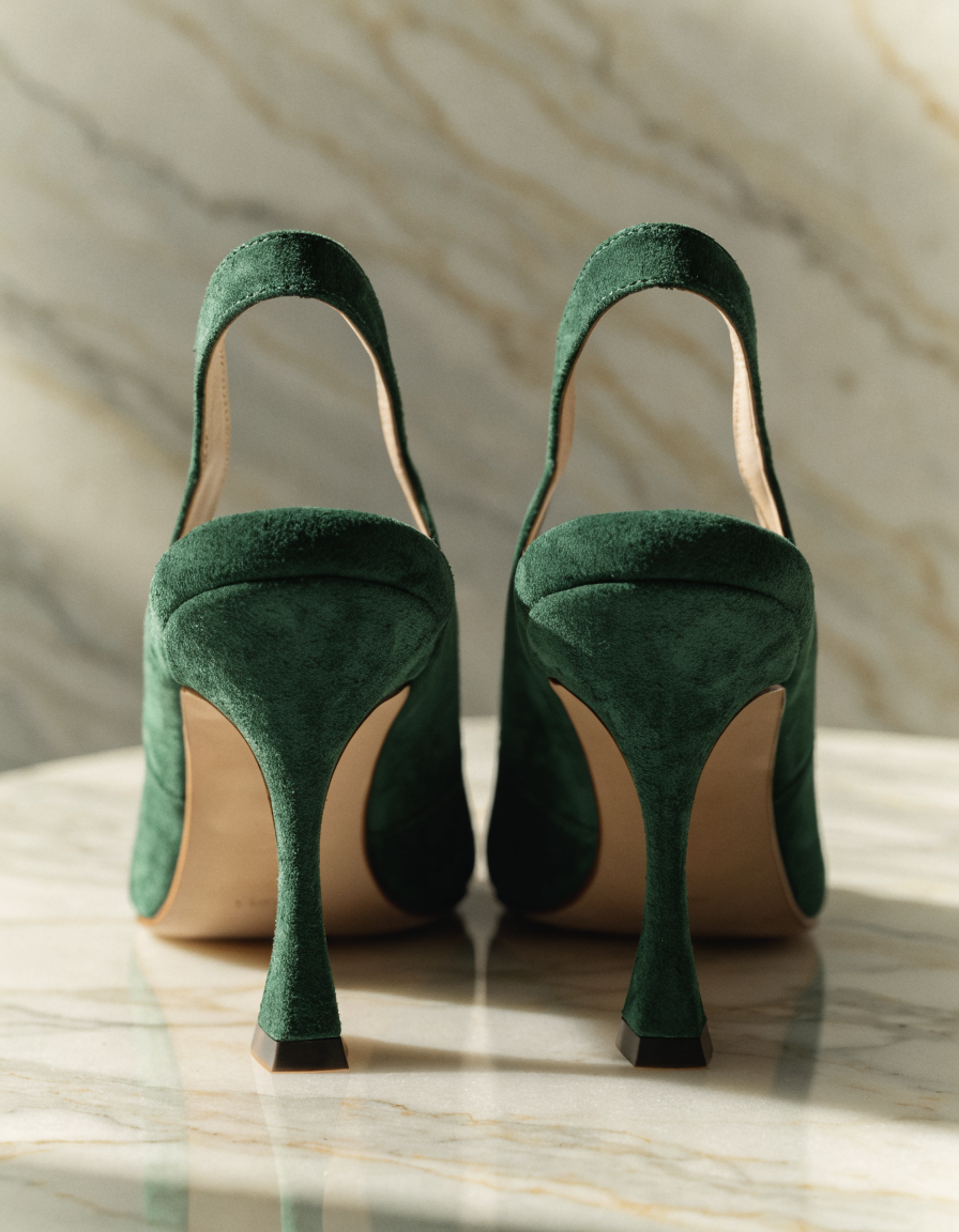 Rear view of the green dress heels showing heel height and back strap