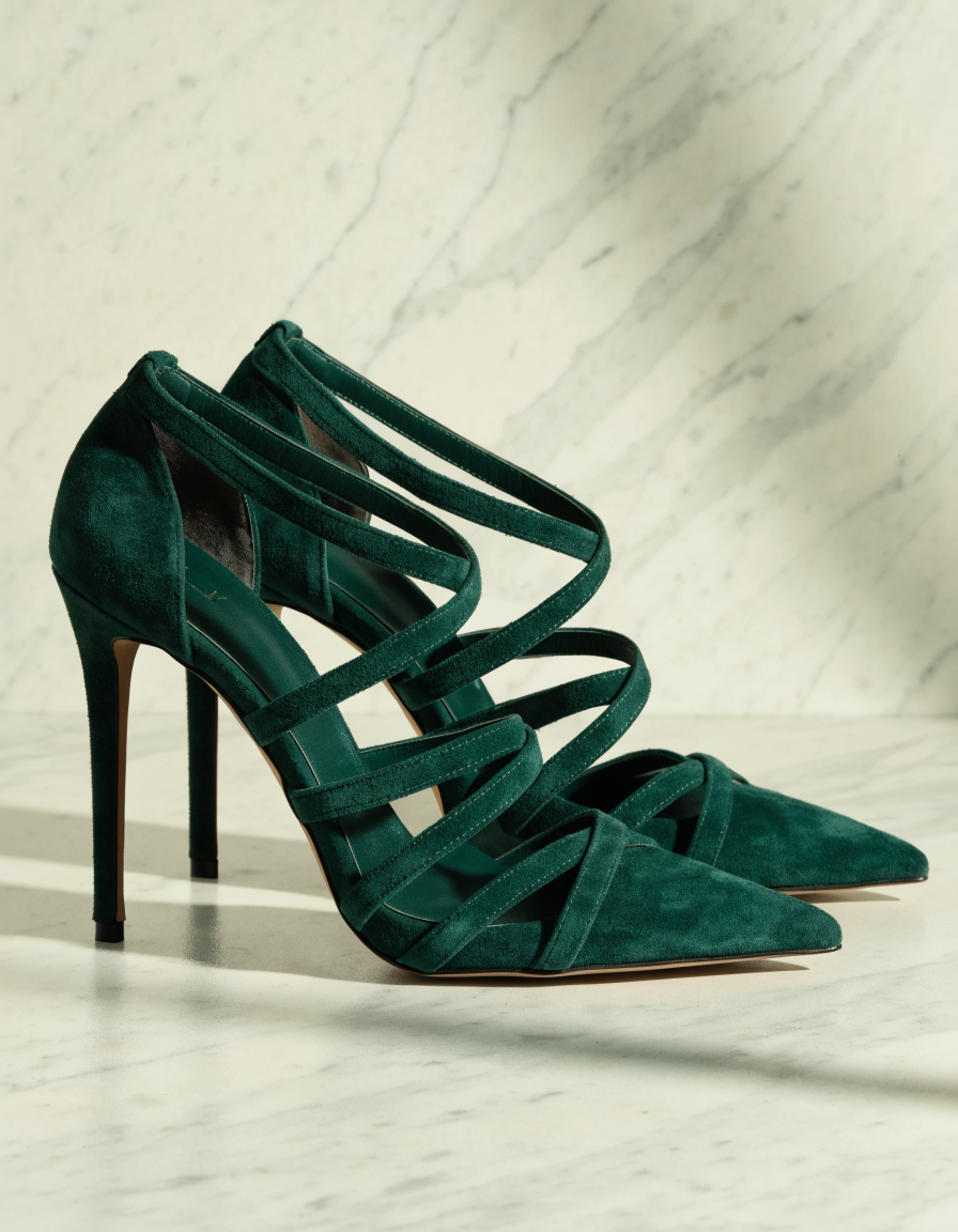 Green multi-strap heels at a three-quarter angle showing strap upper and heel